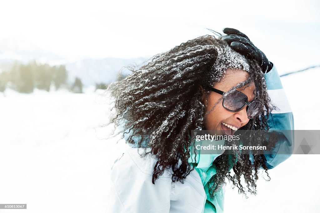 Portrait of young woman in the snow