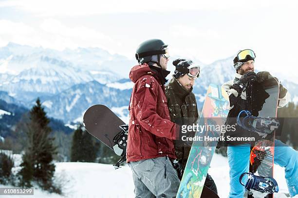 3 friends on winter holiday - snow board stock pictures, royalty-free photos & images