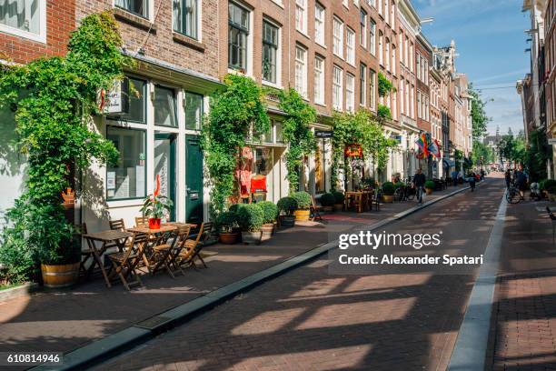 prinsenstraat shopping street in amsterdam, holland, netherlands - traffic free stockfoto's en -beelden