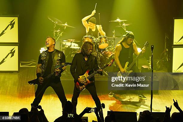 James Hetfield, Kirk Hammett, Lars Ulrich, and Robert Trujillo of the heavy metal band Metallica perform during a special Fifth Memember fan club...