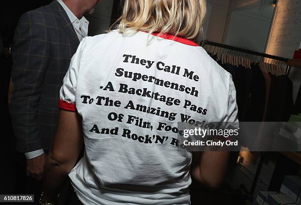Shep Gordon Supermensch shirt worn by a guest is seen as Alice Cooper, Shep Gordon and Shinola celebrate the release of Gordons Memoir, "They Call Me...