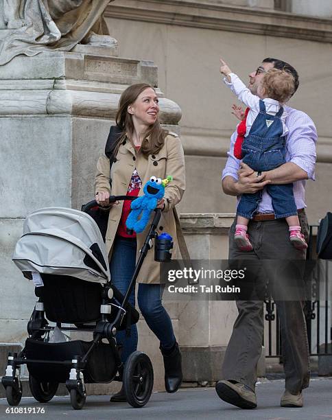 Chelsea Clinton, Marc Mezvinsky, and Charlotte Clinton Mezvinsky are seen on September 27, 2016 in New York City.