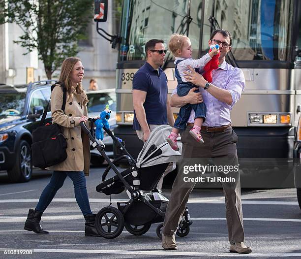 Chelsea Clinton, Marc Mezvinsky, and Charlotte Clinton Mezvinsky are seen on September 27, 2016 in New York City.