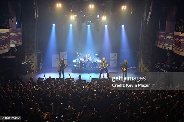 Robert Trujillo, Lars Ulrich, James Hetfield, and Kirk Hammett of the heavy metal band Metallica perform during a special Fifth Memember fan club...