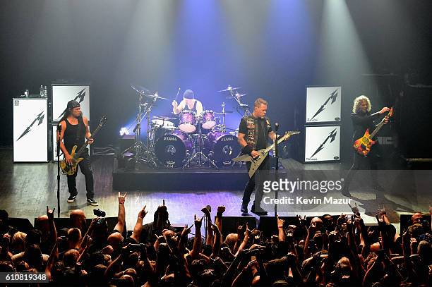 Robert Trujillo, Lars Ulrich, James Hetfield, and Kirk Hammett of the heavy metal band Metallica perform during a special Fifth Memember fan club...