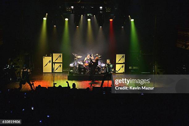 Robert Trujillo, Lars Ulrich, Kirk Hammett, and James Hetfield of the heavy metal band Metallica perform during a special Fifth Memember fan club...