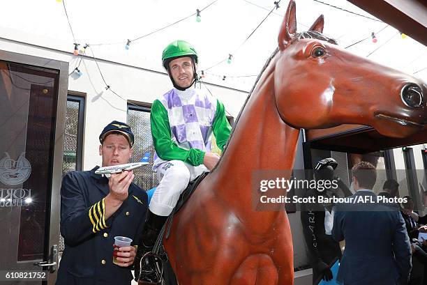 Joel Selwood as Michelle Payne on Prince of Penzance and Mark Blicavs during the Geelong Cats AFL post-season celebrations at the Lord of Isles Hotel...