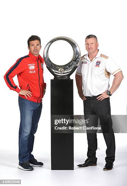 Adelaide United coach Guillermo Amor and Newcastle Jets coach Mark Jones pose during the 206/17 A-League media day at AAMI Park on September 28, 2016...