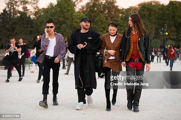Demna Gvasalia, Vetements designer, Lotta Volkova, stylist, after Jacquemus at the Tuileries on September 27, 2016 in Paris, France.