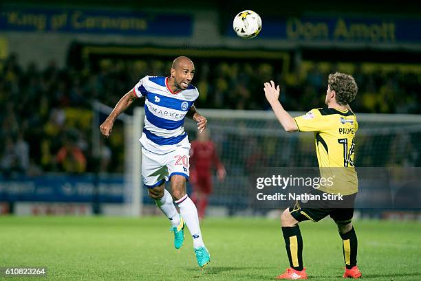 Karl Henry of Queens Park Rangers and Matt Palmer of Burton Albion in action during the Sky Bet Championship match between Burton Albion and Queens...