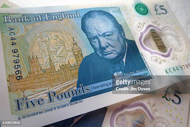 Photo illustration of the new British five pound note, featuring a portrait of Sir Winston Churchill, on September 27, 2016 in London, England. The...