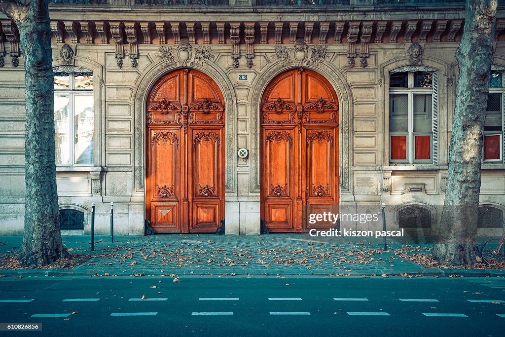 Traditional European wood gate in the boulevard of Paris