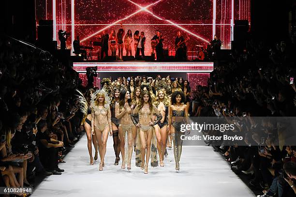 Model walks the runway during the Etam show as part of the Paris Fashion Week Womenswear Spring/Summer 2017 on September 27, 2016 in Paris, France.