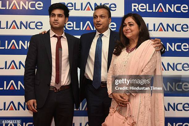 Reliance Communications Chairman Anil Ambani with his wife Tina Ambani and son Anmol Ambani arrives during Annual General Meeting of Reliance...