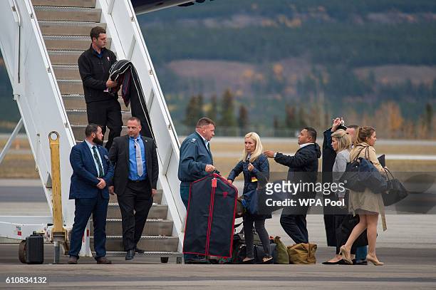 Staff including the Duchess of Cambridge's hairdresser Amanda Cook Tucker and PA and Stylist Natasha Archer arrive at Whitehorse Airport on September...