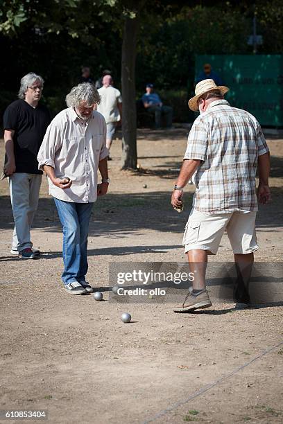 playing balls - petanque - petanque stock pictures, royalty-free photos & images