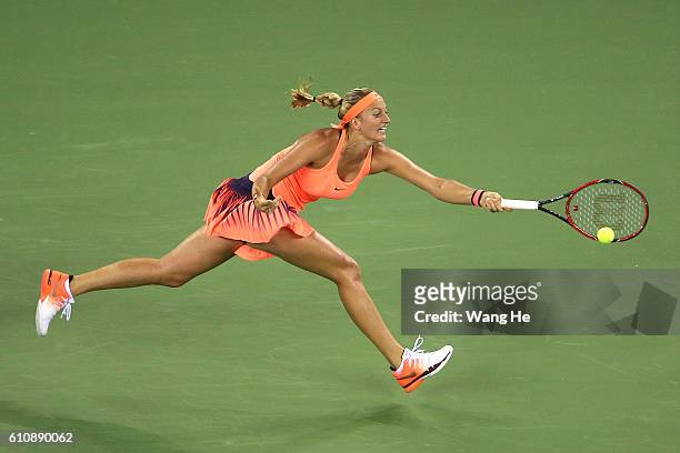 Petra Kvitova of Czech returns a shot during the match against Angelique Kerber of Germany on Day 4 of 2016 Dongfeng Motor Wuhan Open at Optics...