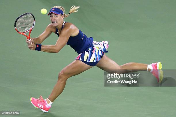 Angelique Kerber of Germany returns a shot during the match against Petra Kvitova of Czech on Day 4 of 2016 Dongfeng Motor Wuhan Open at Optics...