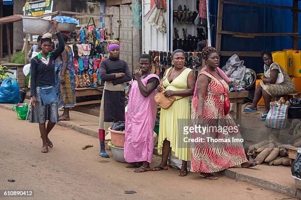 Kumasi, Ghana A group of African women stands in front of a shoe shop in a shopping street of Kumasi on September 06, 2016 in Kumasi, Ghana.