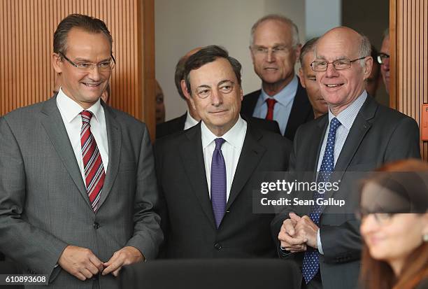 European Central Bank President Mario Draghi arrives with Bundestag Europe Commission Chairman Gunther Krichbaum and Bundestag President Norbert...