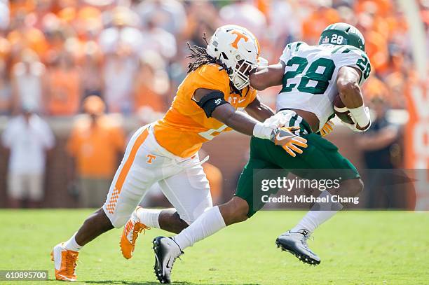 Linebacker Jalen Reeves-Maybin of the Tennessee Volunteers looks to tackle running back Dorian Brown of the Ohio Bobcats at Neyland Stadium on...