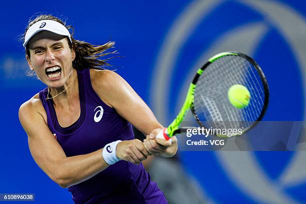 Johanna Konta of Great Britain returns a shot during the third round match against Carla Suarez Navarro of Spain on day four of the 2016 WTA Dongfeng...