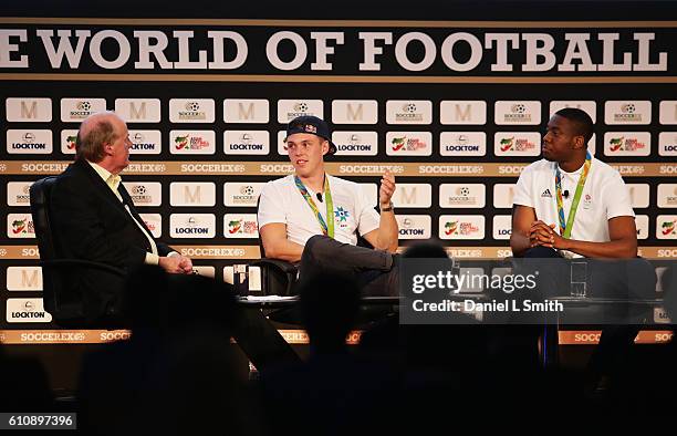 David Davies, Soccerex Consultant, Joe Clarke, Team GB K1 Slalom Canoeist and Lutalo Muhammad, Team GB Taekwondo athlete talk during day 3 of the...