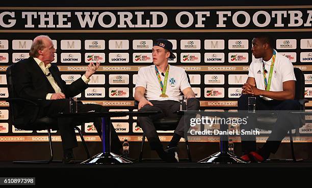 David Davies, Soccerex Consultant, Joe Clarke, Team GB K1 Slalom Canoeist and Lutalo Muhammad, Team GB Taekwondo athlete talk during day 3 of the...