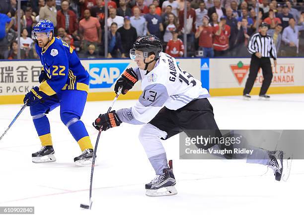 Johnny Gaudreau of Team North America gets a shot off against Team Sweden during the World Cup of Hockey 2016 at Air Canada Centre on September 21,...