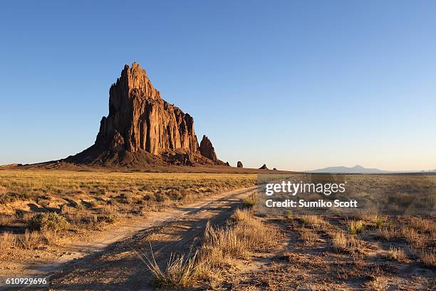 shiprock at sunrise, new mexico - new mexico mountains stock pictures, royalty-free photos & images