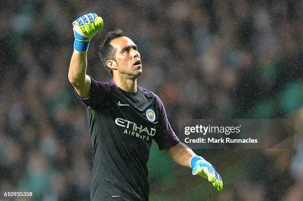 Claudio Bravo of Manchester City celebrates after Fernandinho scored their first goal during the UEFA Champions League group C match between Celtic...