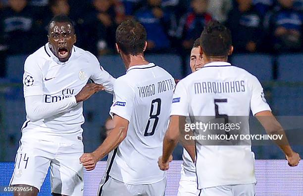Paris Saint-Germain's French midfielder Blaise Matuidi celebrates with teammates after scoring during the UEFA Champions League Group A football...