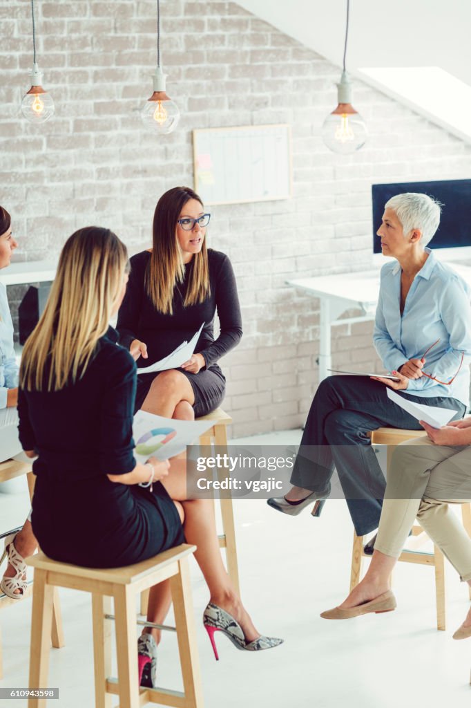Female Business Team Meeting High-Res Stock Photo - Getty Images