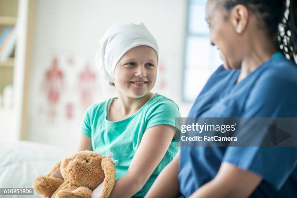 talking with a cancer patient - cancer 2016 stock pictures, royalty-free photos & images