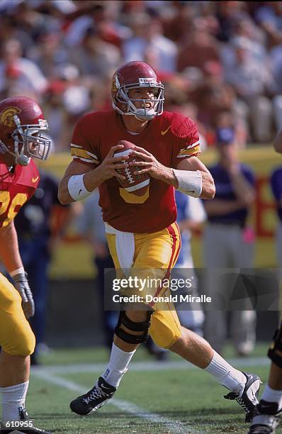 Quarterback Carson Palmer of the Southern California Trojans looking to throw the ball during the game against the Kansas State Wildcats at the...