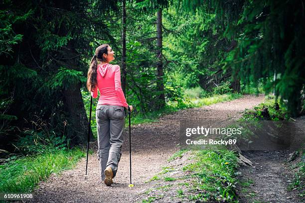 enjoying freedom in the nature - nordic walking stock pictures, royalty-free photos & images