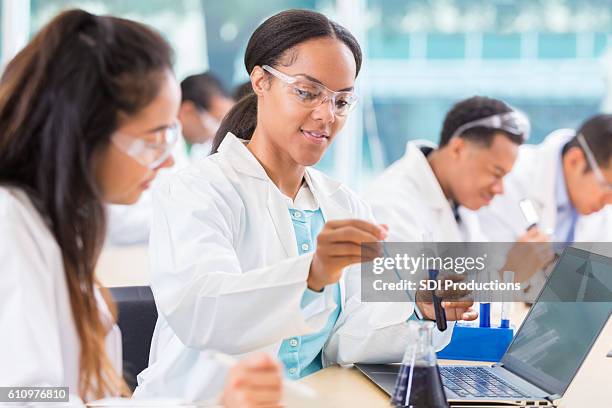 chemists work on project in lab - life science stock pictures, royalty-free photos & images