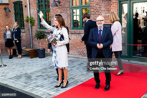 Princess Marie of Denmark waves to spectators at the opening ceremony of ceramic art company, Kähler's, new head quarter and historic exhibition in...