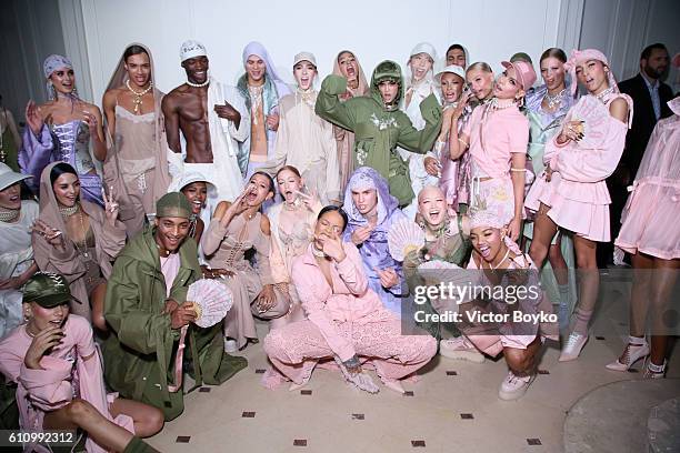 Rihanna is seen with models backstage during FENTY x PUMA by Rihanna at Hotel Salomon de Rothschild on September 28, 2016 in Paris, France.