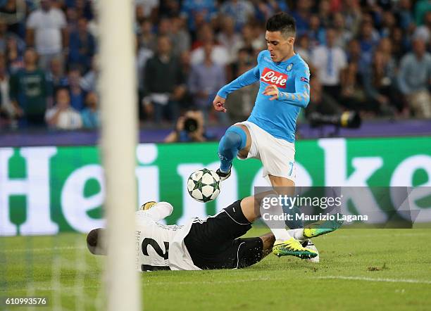 Josè Maria Callejon of Napoli competes for the ball with Juio Cesar of Benfica during the UEFA Champions League match between SSC Napoli and Benfica...