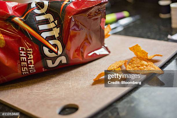 Bag of PepsiCo Inc. Doritos brand snack chips is arranged for a photograph in Tiskilwa, Illinois, U.S., on Wednesday, Sept. 28, 2016. PepsiCo Inc. Is...