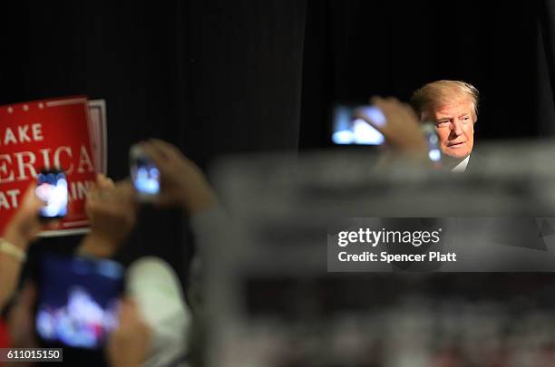 Donald Trump walks on stage at a rally on September 28, 2016 in Council Bluffs, Iowa. Trump has been campaigning today in Iowa, Wisconsin and Chicago.