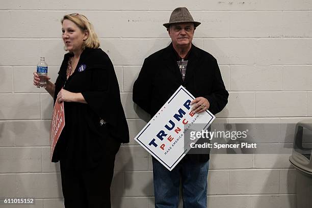 Donald Trump supporters wait for him to speak at a rally on September 28, 2016 in Council Bluffs, Iowa. Trump has been campaigning today in Iowa,...