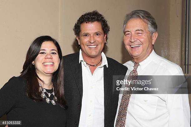 Nannette Velez, Senior Project Manager of the Latin Grammy Cultural Foundation, Colombian singer Carlos Vives and Manolo Diaz, Vice President of the...