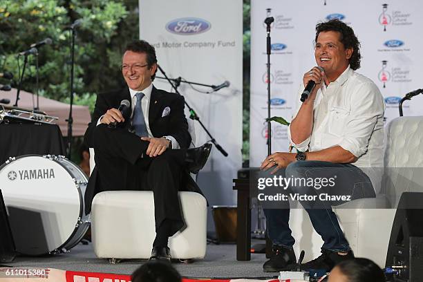 Colombian singer Carlos Vives and president of the Latin Recording Academy, Gabriel Abaroa attend the Latin Grammy en las Escuelas Mexico 2016 at...