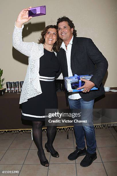 Colombian singer Carlos Vives and guest attend the Latin Grammy en las Escuelas Mexico 2016 at Escuela Secundaria Tecnica 31 Roberto Medellín Ostos...