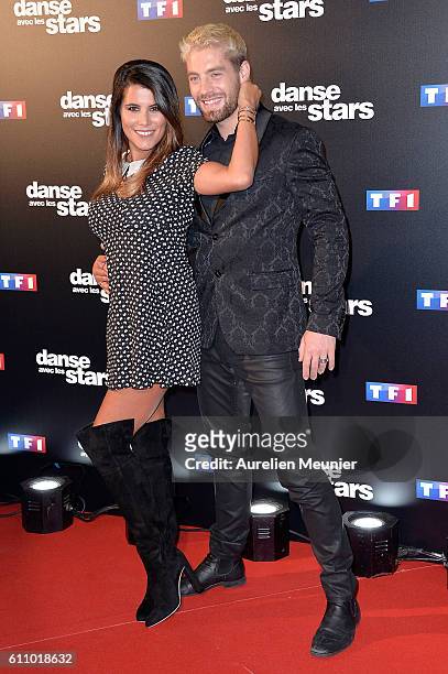 Karine Ferri and Yann Alrick Mortreuil pose during the 'Danses With The Stars' photocall on September 28, 2016 in Paris, France.