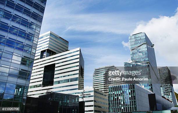 modern office buildings in amsterdam - amsterdam business stock pictures, royalty-free photos & images