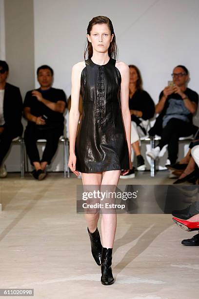 Model walks the runway during the Olivier Theysen show as part of the Paris Fashion Week Womenswear Spring/Summer 2017 on September 27, 2016 in...