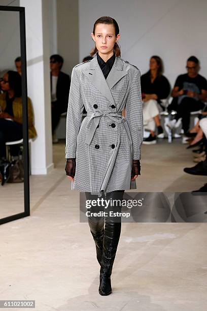 Model walks the runway during the Olivier Theysen show as part of the Paris Fashion Week Womenswear Spring/Summer 2017 on September 27, 2016 in...